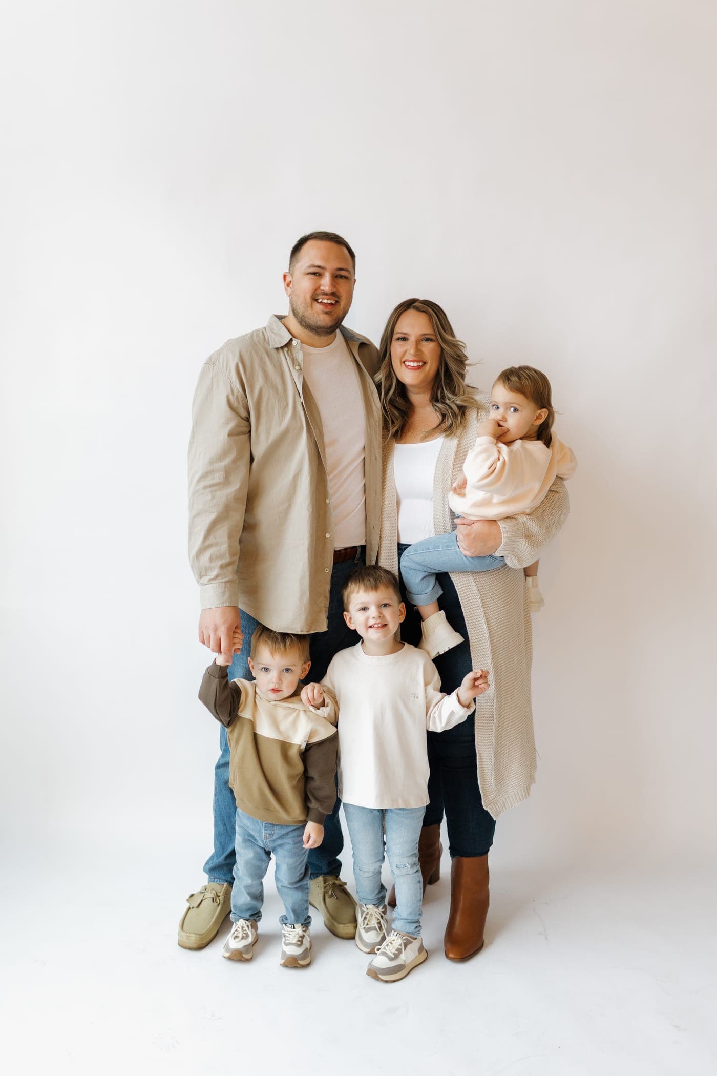 Samuel Tupy with his wife and children